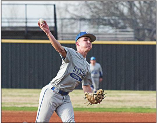 Bryce Hughey pitches the ball.