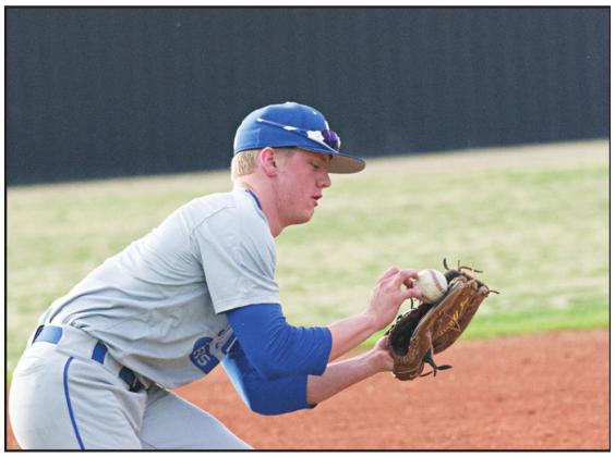 Blake Parrick holds on to a wind-blown popup