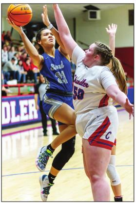 66 Conference basketball action