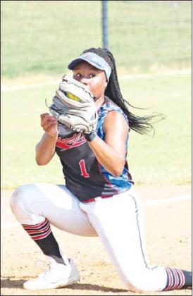 Chandler third baseman, Jaelyn Robertson, eyes the runners after catching a line drive in her face against Tecumseh in the McLoud tournament.