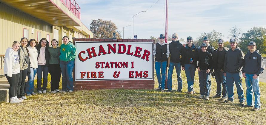 Chandler FFA members, shown above at the fire station, recently completed their third annual project of weedeatering around fire hydrants in Chandler. The goal Our hope is to make the hydrants more easily accessible to Chandler Fire Department in case of emergency during the winter months.