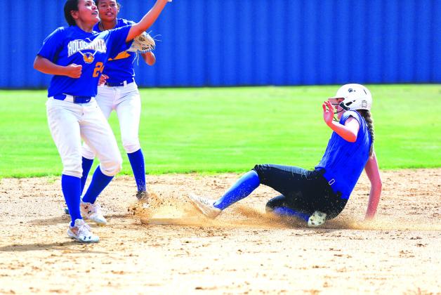 Camryn Wilson beats the throw to second base before moving onto third against Holdenville. Photo/Beth Young