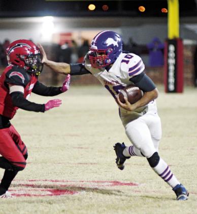 Casmen Hill (10) provided the visual metaphor for the Chandler game by stiff-arming a would-be tackler out of his way. Photo/Brian Blansett