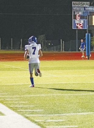 Bryson Taylor runs alone to the end zone after battling for a catch and leaving the defenders in his wake during the second quarter Friday night. Photo/Brian Blansett