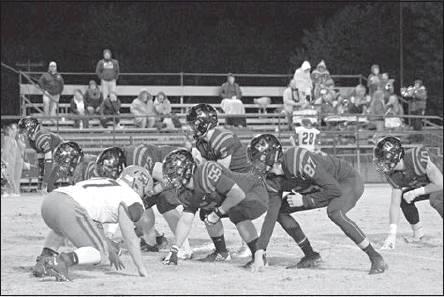 Below, Meeker’s Caden Wolford (28) declares it a touchdown as Jacob Martin (1) crosses the end zone. Photo/Brian Blansett