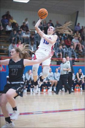 Meeker and Chandler matched up in a pair of exciting games last week that featured large comebacks. Above, Chandler’s Leah Brannon (10) puts up a shot in the first half. The Lady Lions grabbed a 30-16 lead in the second half, but Meeker tied the game at 40-40 by the end of the third. Chandler pulled away in the fourth quarter and won, 58-45.