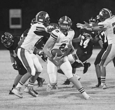Above, Chandler’s Ty Garver reaches for a pass against Luther last Thursday. Photo/Brian Blansett Below, Chandler quarterback Alec Jackson pops through the line and makes a cut. Photo/Brian Blansett Top left, Meeker’s Braxton Bussell returns an interception against Star Spencer while freshman Johnnie Brown blocks. Photo/Robyn Miller Left, Maddox Motley (88) catched a pass for North Rock Creek against Metro Christian. Photo/Rick Hester