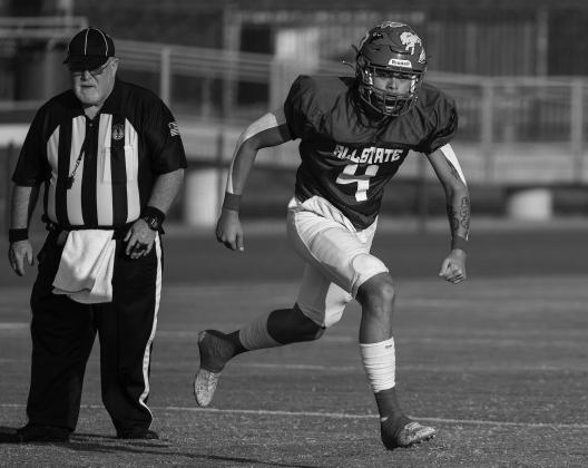 Prague’s Lance Fixico comes up from a safety position to pursue a runner during the recent Oklahoma Coaches Association All-State game. Fixico played most of the game as a safety for the east. Photo/Rick Hester