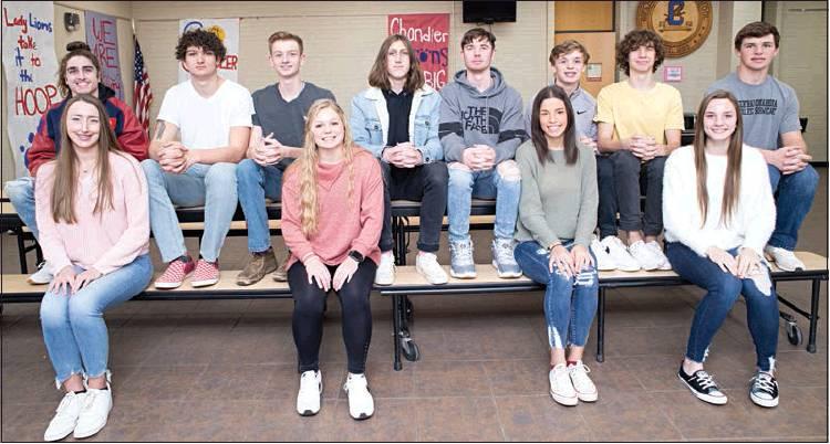 The basketball court, bottom photo, includes: Morgan Fowble, senior, with escorts Caedon Parris and Dylan Mahan; Jaedyn Wayland, at-large, with escorts Kyler Henley and Kaden Jones; Hannah Vandenbrand, junior, with escorts Chase Campbell and Dalton Alsip; Leah Brannon, sophomore, with escorts Luke Russell and Jarin Greenfield. Not pictured are flowergirl Paisley Hughey and crownbearer Brandt Terrell