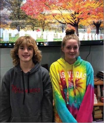 Above, Chandler Jr. High students Joel Telford and Sydney Duncan, who won the Jr. High Student Council Veterans’ Day Poetry Contest. Joel Telford, 7th grade,1st place winner, won $75.00. Sydney Duncan, 8th grade, Runner-up, won $50.00. BancFirst sponsored the prizes for this contest. Photo/ submitted