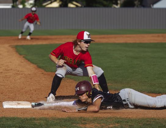 Dale made it to the state semifinals last week before falling, 2-1, to Cashion. The Pirates beat Panama, 9-3, in the first round and finished the season with 27-5 record and tanked No. 2 in the Class 2A. Top, catcher Ethan Douglas catches a chalk enhanced hard strike from pitcher Jack Rooker. Above left, pitcher Jake Rooker delivers one to the plate against Panama. Above right, Easton Edmonson applies tag on a Cashion runner after a pickoff attempt. Photos/Rick Hester