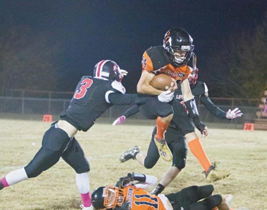 Cole Sikes (84) goes airborne over teammate Lane Kulp (11) during Wellston’s win over Life Prep Academy Thursday night. Photo/Chelsea Weeks