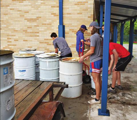 Lions help with playground material