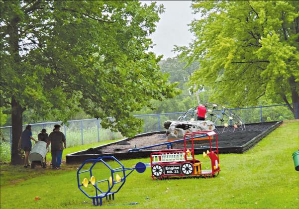 Lions help with playground material