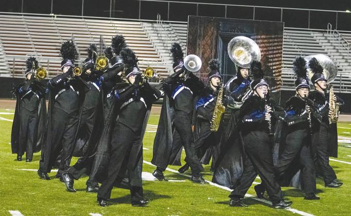 The Pride of Chandler performs “The Raven,” in the finals at the Oklahoma Bandmasters Association 1A to 3A State Championships on Oct. 12. They won the 2A State Champ title in the prelims while also picking up awards for General Effect and Visuals. The band placed 11th out of 12 in the finals. Photo/Jennifer Pryor