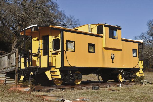 One of two cabooses sits on property owned by Debbie and Dale Brannon. The cabooses were on the property when they bought it in 2014 and the Brannons hope to turn both into AirBnBs. Photo/Emily Kalka