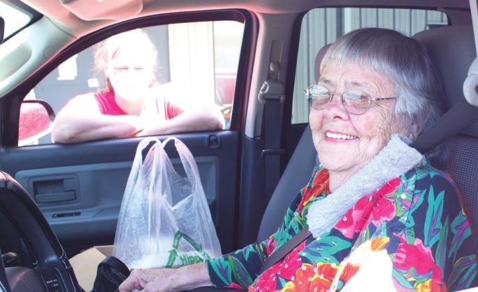Mary Hall in the Project H.E.A.R.T. drive-through in Meeker. Photo/Brian Blansett