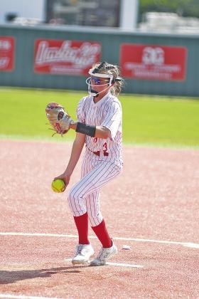 Above left, McLoud shortstop Miley Hicklin throws to first for an out in the Lady Redskins’ 2-0 loss to Stroud on Saturday. Above right, a jubilant crowd greets Stroud’s Carly DeLeon at home plate after her two-run, two-out homer to beat McLoud. Left, Meeker third baseman Brodie Chance throws after fielding a bunt against Prague in action on Thursday. Right, winning pitcher Jaxcyn Goodnight delivers a pitch against Meeker. Photos/Brian Blansett