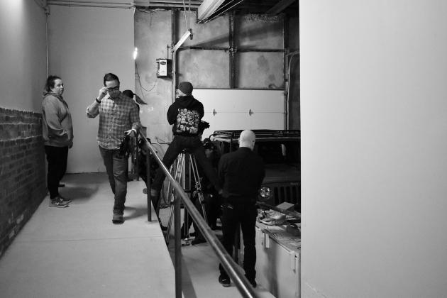 The cast and crew of “Reverence” film a forensics scene in the basement of the First Bank building on Dec. 21. It was day 16 of their 20-day shoot, which is scheduled to end this week. “Reverence” is a mystery thriller focusing on the story of a father coming to terms with his military past while searching for his missing daughter it a small town. It’s directed by Kyle Kauwika Harris and produced by SafeHouse Films. Photos/Emily Kalka