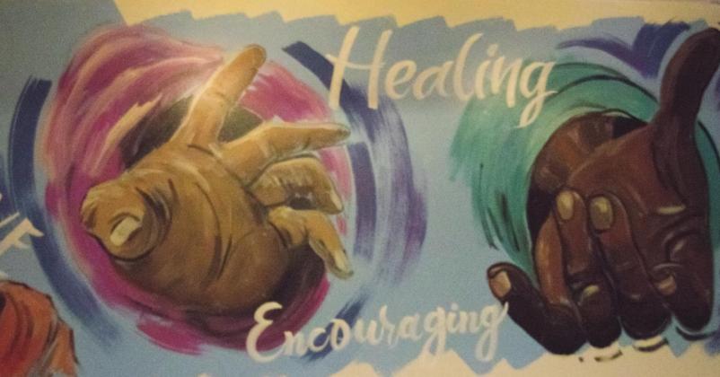 Pictured above, these multicultural hands can be found at the Helping Hands Community Foundation building on 112 East 7th in Chandler. Photo/Kendra Johnson.
