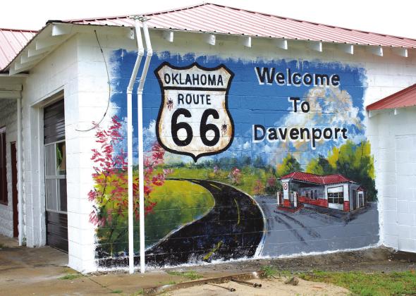 One of three new murals painted on the side of the old Texaco station in Davenport. The building is currently being renovated to be the new welcome center for the town. The mural was painted by Bob Palmer. Photo/Emily Kalka