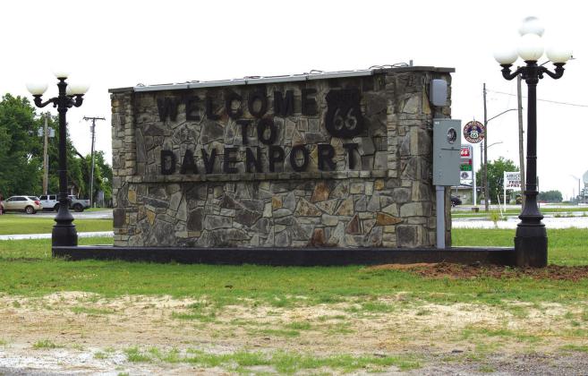 Above is the opposite side of the Davenport Welcome Center, which features a mural by Bob Palmer and the Route 66 Cenntennial logo. Above is the new town sign put in place next to the Welcome Center. Photos/Emily Kalka