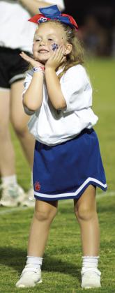 Chandler tiny cheerleader Hadleigh Daniels entertains the crowd as part of the halftime show at the Chandler-Stroud game Friday night. Photo/Brian Blansett