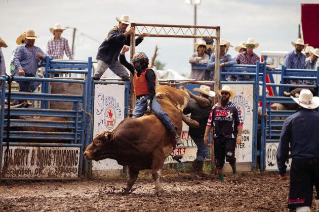 Ryker Butler of McLoud rides a bull in the first round on his way to winning the championship in the event at the International Finals Youth Rodeo at the Heart of Oklahoma Exposition Center last week. He recorded a score of 84 points in the second round and then scored 82.5 in the finals for an overall average of 166.5 to claim the title. For more photos, see Page 5A. Photo/Evan Kennemer