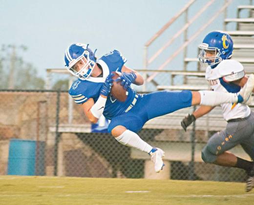 Dylan Collins comes down a pass for Stroud against Choteau Friday night. He caught three passes on the night for 69 yards. Photo/Chelsea Weeks