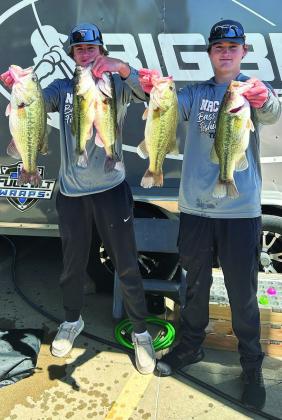 Left C.J. Stephens, left, and Reid Rollins with their stringers that got them third place in the tournament on Grand Lake.