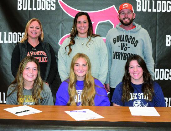 Three Davenport seniors signed last week to play college softball. Seated from left, they are Maloree Byford, who will play at Bethany College; Faith Campbell, who will play for Southwestern College; and Macy Keeling, who will play at Rose State College. With them are, from left in the back row, coaches Heather Gaylord, Emmie Smith and Brett Case. Photo/Brian Blansett