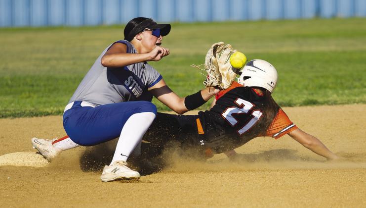 Stroud shortstop Miyah Clark gloves the throw as Wellston’s Savanah Gaylord slides into second. Photo/Beth Young