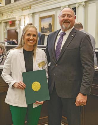Cory honored at House