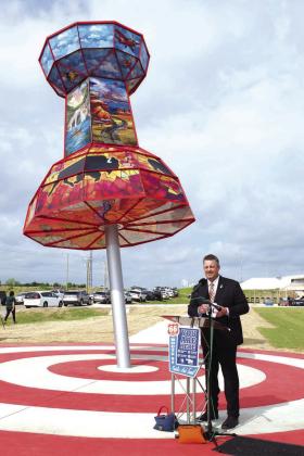 Executive Director of the Oklahoma Turnpike Authority, Joe Echelle, speaks at the ribbon-cutting ceremony for three public art displays near Route 66 and the Turner Turnpike in Wellston. Photo/Emily Kalka