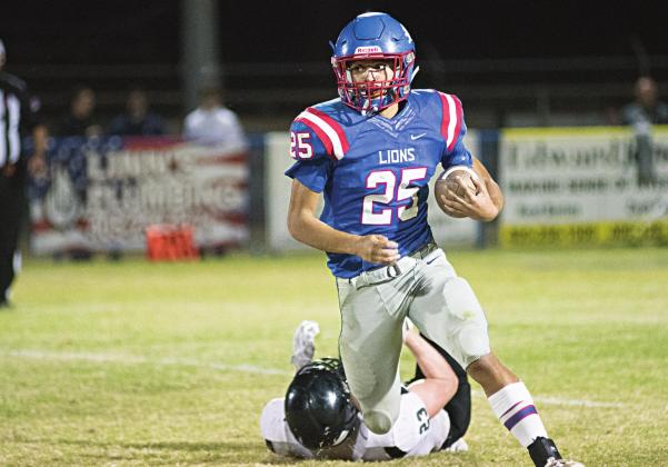 EVROLET Casmen Hill breaks into the clear and picks up a portion of his 282 yards rushing Friday night. Photo/Brian Blansett HANDLER, OK