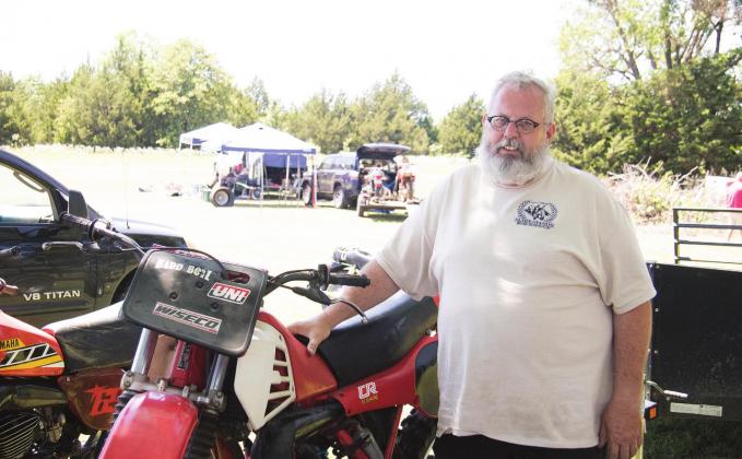 Pictured above, Gerald Tims poses with one of his bikes behind Seaba Station at the May swap meet. Photo/ Kendra Johnson.