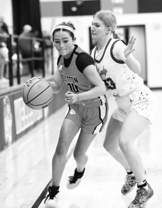 Shilo Davenport (10) tightropes the out of bounds line during Davenport’s win over Coyle last week. Photo/Brian Blansett