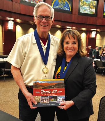 Left is Jim Ross and right is Shellee Graham. The two display their book on Route 66 while wearing their Oklahoma Book Award medallions. Photo Provided by Shellee Graham.