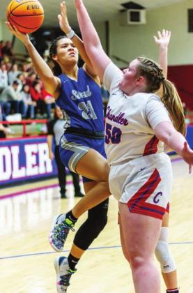 We incorrectly identified players in this photo in last week’s edition. No. 21 for Stroud is Kileigh Mixon and No. 50 for Chandler is Tatumn German.