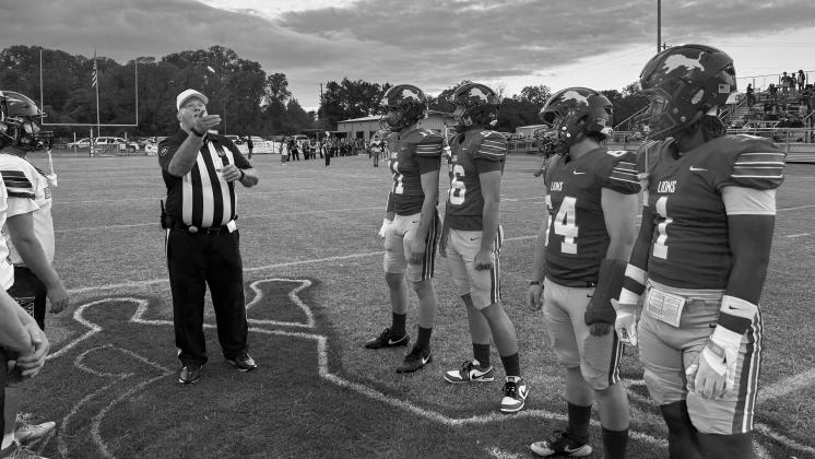 Chandler’s captains watch the coin toss before the Little Axe game. Photo/Brian Blansett