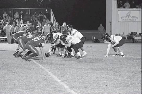 Below, Davenport’s offense lines up for a snap. Photo/Kim Hobill