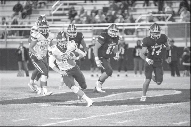 Stroud quarterback Grant Elerick (3) peels off yardage against Wynnewood in the Tigers’ 50-9 win. Photo/Tommie Marshall