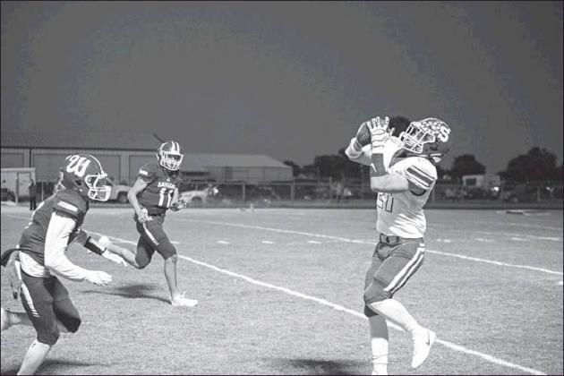 Lower right, Drew Elerick (21) grabs a pass during the Stroud’s win over Wynnewood. Photo/Tommie Marshall