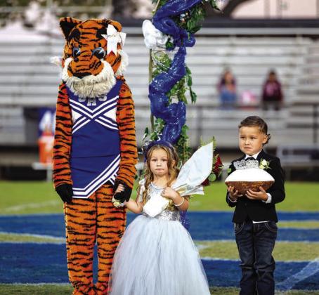 It’s time for another photo caption contest! Tell us what you think is going through the minds of these adorable kiddos and mascot. Send your captions to news@lcnok.com by Monday, Nov. 2. We’ll choose the top three to print in our next issue and the winner will receive a free year’s subscription to the newspaper. Pictured are Dottie Johnson and Kade Aquino at the Stroud Homecoming ceremony on Oct. 23. Photo/Beth Young