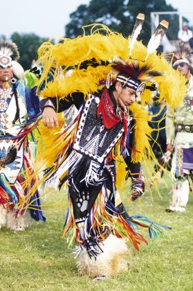 Skush McClellan from Perkins dances Saturday night at the 61st Sac and Fox Pow-Wow, which was held Thursday through Sunday at Jim Thorpe Memorial Park south of Stroud. For more photos of the annual gathering, please see Page 4A. Photo/ Brian Blansett