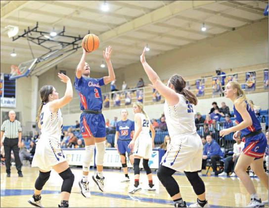 Above, Hannah Vandenbrand puts up a one-hander in the lane during Chandler’s opening round win over Bethel. Vandenbrand had nine points in the second half to help the the Lady Lions’ rally. Photo/Brian Blansett