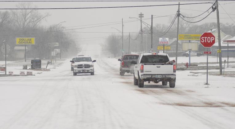 The four-way stop sign at the intersection of Highways 62 and 18 on Sunday. Photo/Brian Blansett
