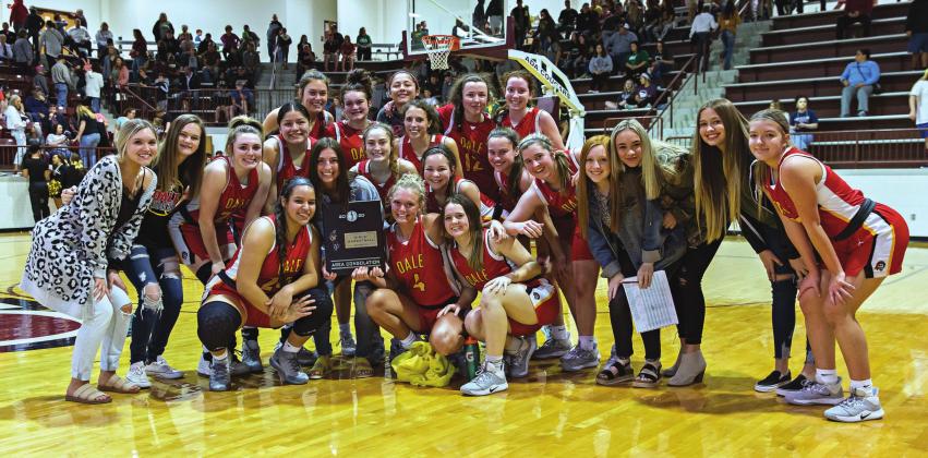 The Dale Lady Pirates pose on the court after earning a berth in the Class 2A state tournament. Photo/Rick Hester
