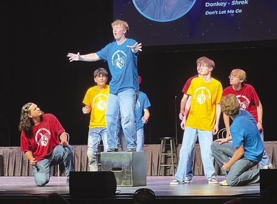 ames Kerr (center) performs during the spotlight on the nominess for best supporting actor.