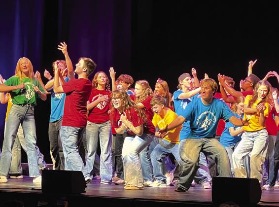 : in the front, Weston Miller, Bethany Descher and James Kerr pose during one of the group numbers at the Discovery Awards.